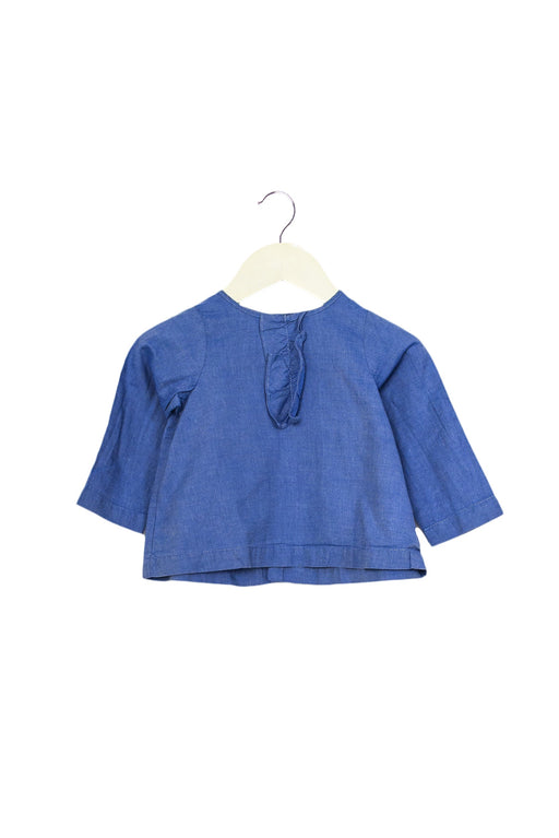 A Blue Long Sleeve Tops from Jacadi in size 6-12M for girl. (Front View)
