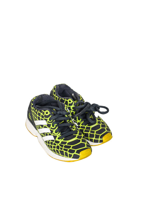 A Yellow Sneakers from Adidas in size 5T for girl. (Front View)