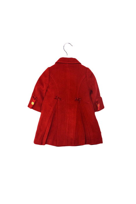 A Red Coats from Nicholas & Bears in size 6-12M for girl. (Back View)