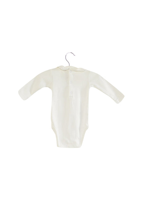 A White Long Sleeve Bodysuits from Jacadi in size 0-3M for girl. (Back View)