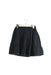 A Navy Short Skirts from Bonpoint in size 4T for girl. (Front View)
