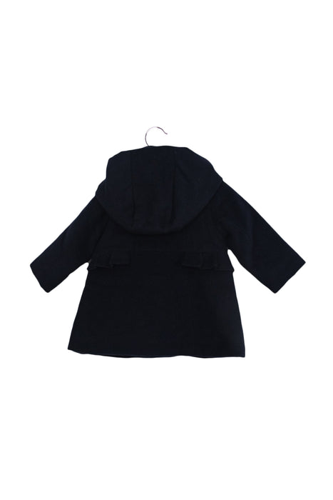 A Navy Coats from Jacadi in size 6-12M for girl. (Back View)