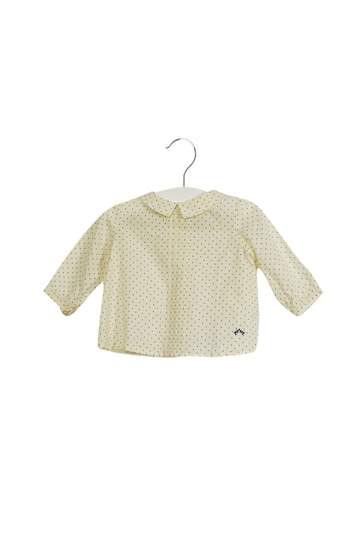 A White Long Sleeve Tops from Nanos in size 3-6M for girl. (Front View)