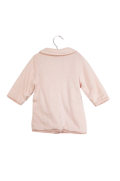 A Pink Coats from Emile et Rose in size 6-12M for girl. (Front View)