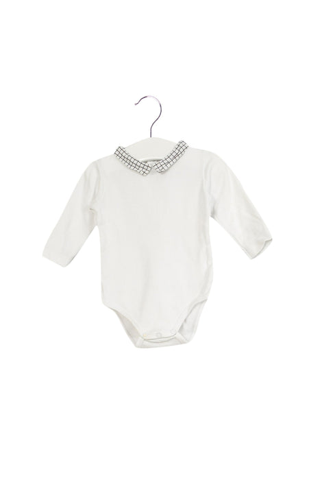 A White Long Sleeve Bodysuits from Jacadi in size 3-6M for girl. (Front View)