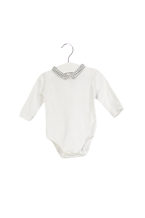 A White Long Sleeve Bodysuits from Jacadi in size 3-6M for girl. (Front View)