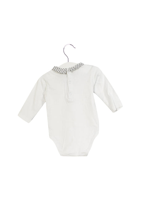 A White Long Sleeve Bodysuits from Jacadi in size 3-6M for girl. (Back View)
