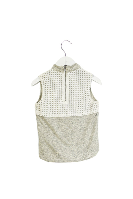 A White Sleeveless Dresses from Gingersnaps in size 12-18M for girl. (Back View)