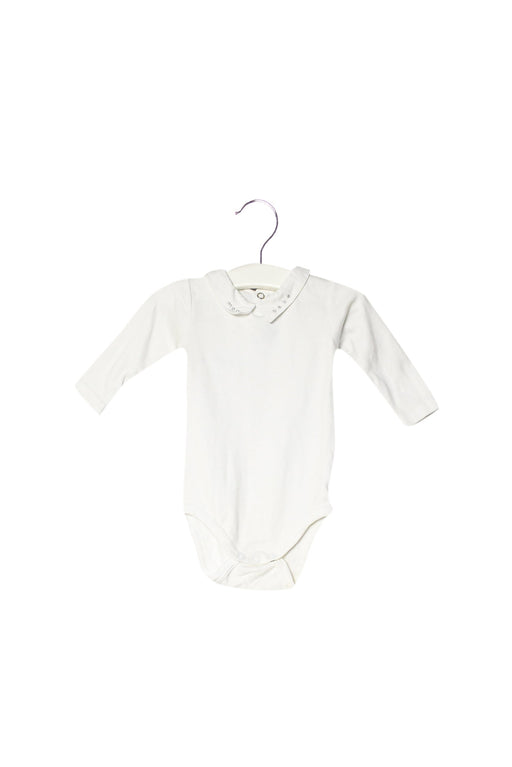 A White Long Sleeve Bodysuits from Jacadi in size 0-3M for boy. (Front View)