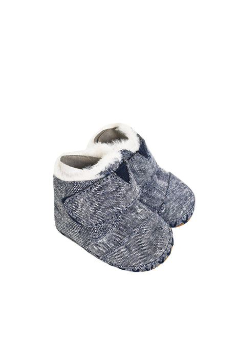 A Navy Boots & Booties from Toms in size 0-3M for neutral. (Front View)