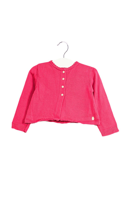 A Pink Cardigans from Dior in size 3-6M for girl. (Front View)