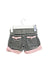 A Black Shorts from and the little dog laughed in size 3-6M for girl. (Back View)
