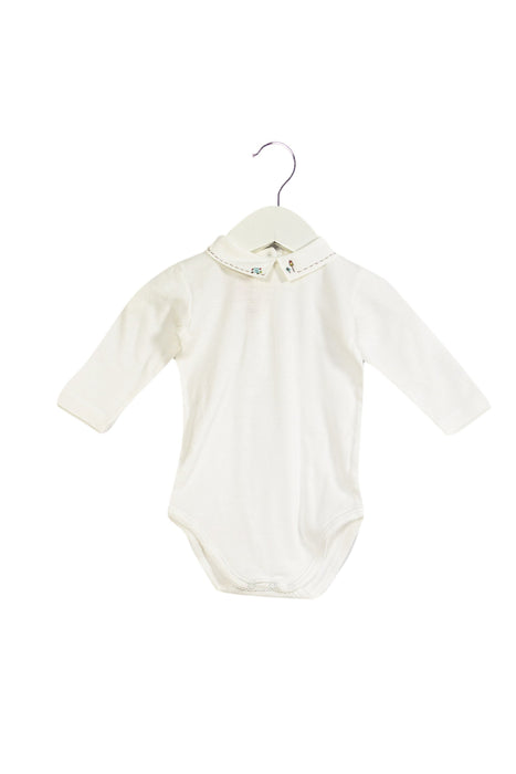A White Long Sleeve Bodysuits from Bonpoint in size 3-6M for girl. (Front View)