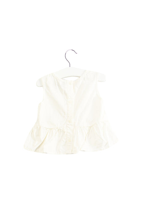 A White Sleeveless Tops from Gingersnaps in size 3-6M for girl. (Back View)