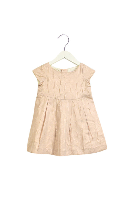 A Pink Sleeveless Dresses from Bonpoint in size 4T for girl. (Front View)