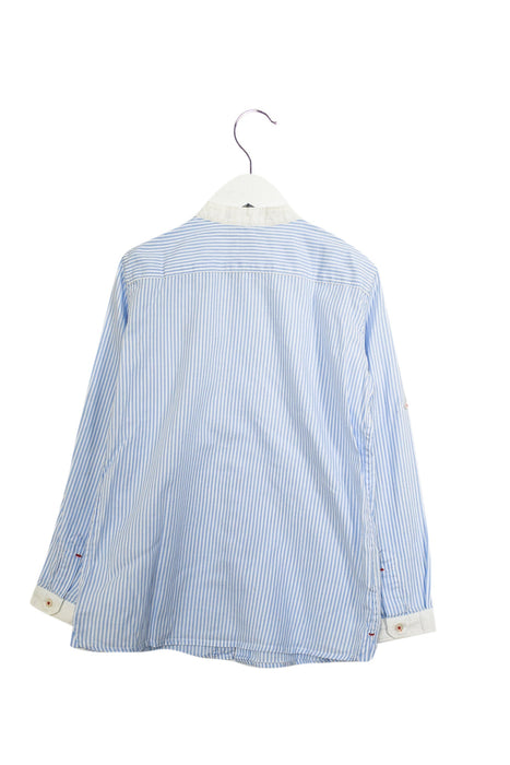 A Blue Shirts from Carolina Herrera in size 5T for boy. (Back View)