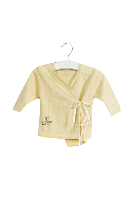 A Ivory Cardigans from Morley in size 6-12M for neutral. (Front View)