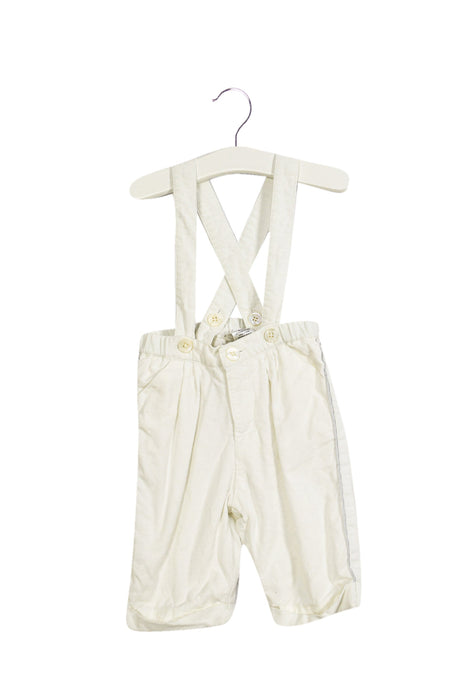 A White Long Overalls from Jacadi in size 3-6M for boy. (Front View)