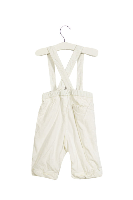 A White Long Overalls from Jacadi in size 3-6M for boy. (Back View)