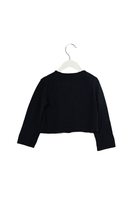 A Navy Cardigans from Familiar in size 4T for girl. (Back View)