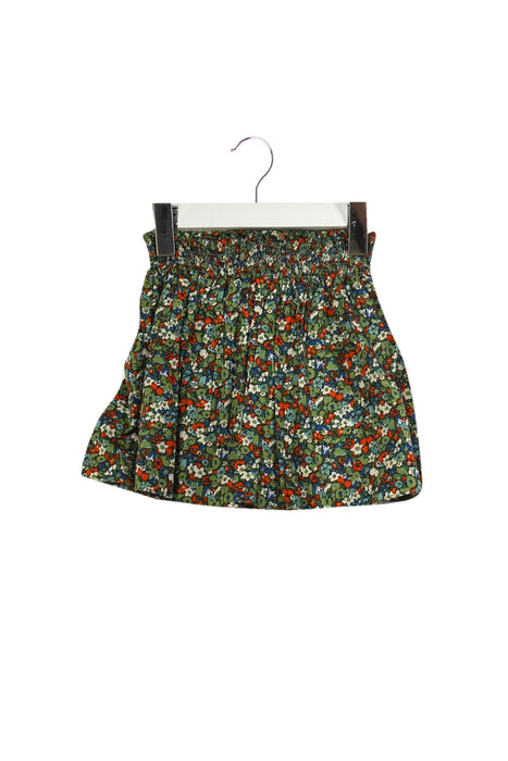 A Green Short Skirts from Bonpoint in size 4T for girl. (Front View)