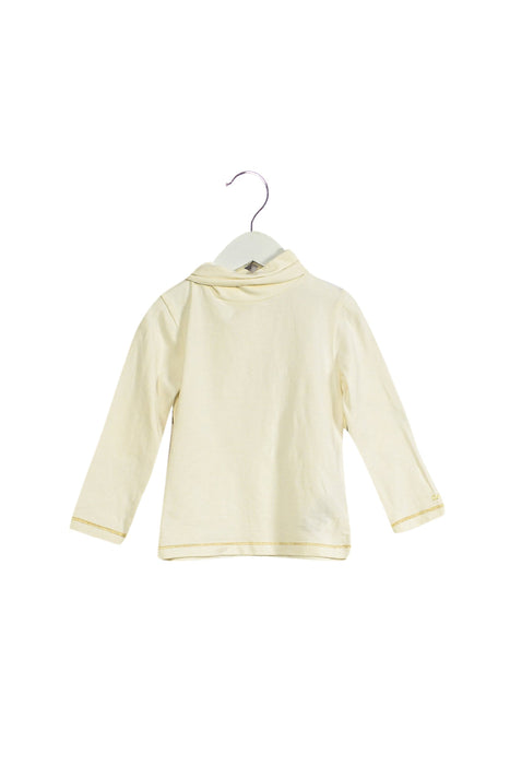 A Beige Long Sleeve Tops from Chloe in size 2T for girl. (Front View)