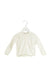 A White Cardigans from Early Days in size 6-12M for girl. (Front View)