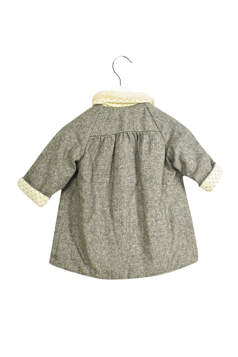 A Grey Coats from Nanos in size 6-12M for girl. (Back View)