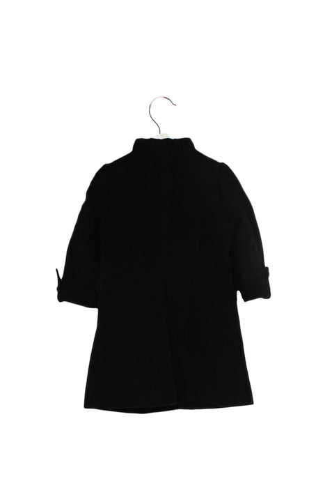 A Black Coats from Nicholas & Bears in size 12-18M for girl. (Back View)