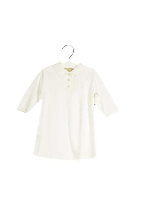 A Ivory Long Sleeve Dresses from Ovale in size 6-12M for girl. (Front View)