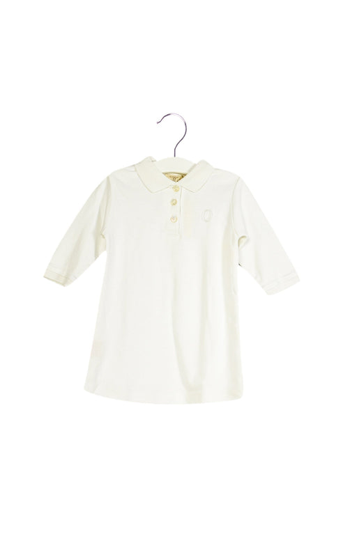 A Ivory Long Sleeve Dresses from Ovale in size 6-12M for girl. (Front View)