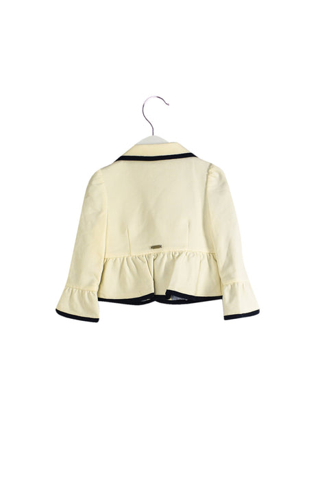 A Ivory Lightweight Jackets from Ferrari in size 4T for girl. (Back View)