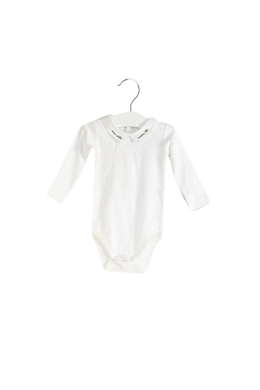 A White Long Sleeve Bodysuits from Jacadi in size 3-6M for girl. (Front View)