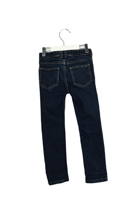 A Navy Jeans from Jacadi in size 6T for girl. (Back View)