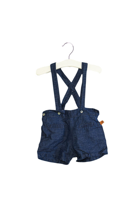 A Blue Shorts from Laranjinha in size 3-6M for girl. (Front View)