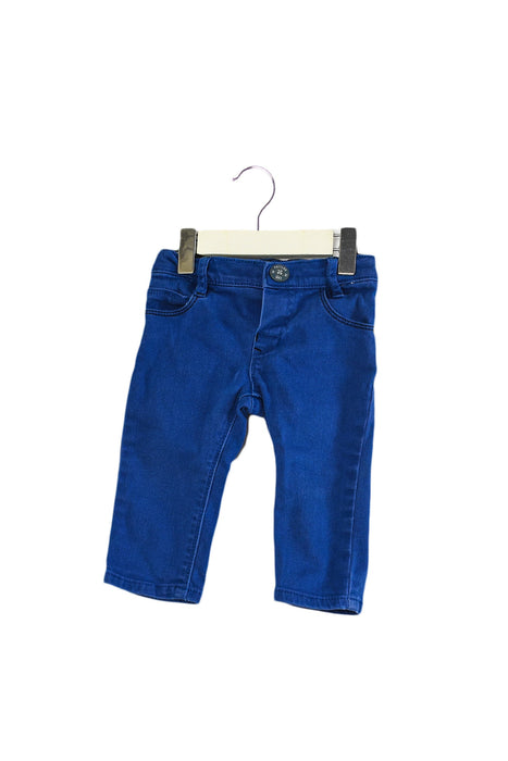 A Blue Jeans from IKKS in size 3-6M for boy. (Front View)