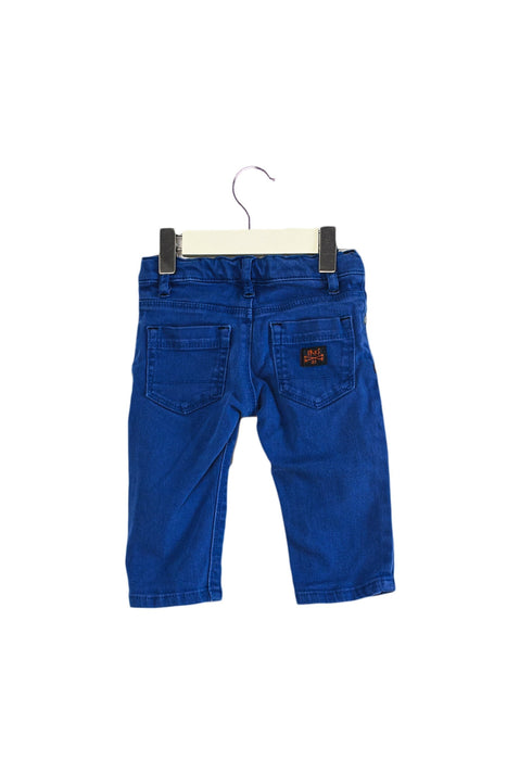 A Blue Jeans from IKKS in size 3-6M for boy. (Back View)