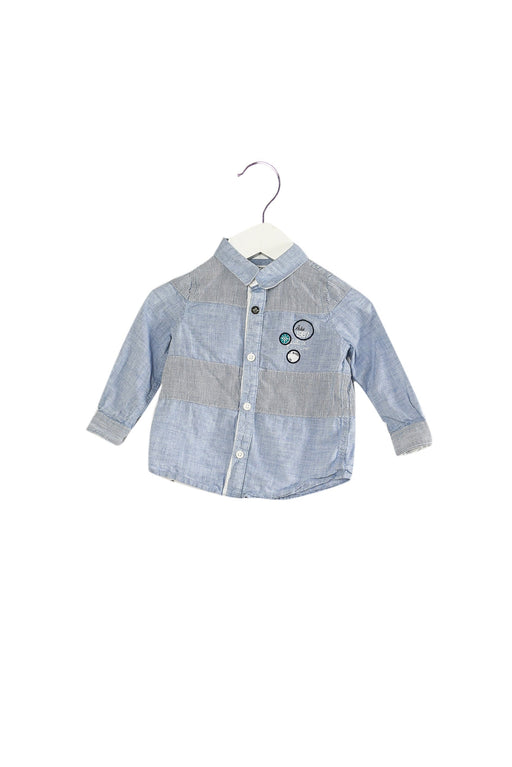 A Blue Shirts from IKKS in size 6-12M for boy. (Front View)