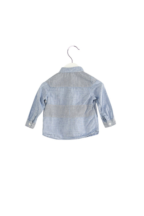 A Blue Shirts from IKKS in size 6-12M for boy. (Back View)