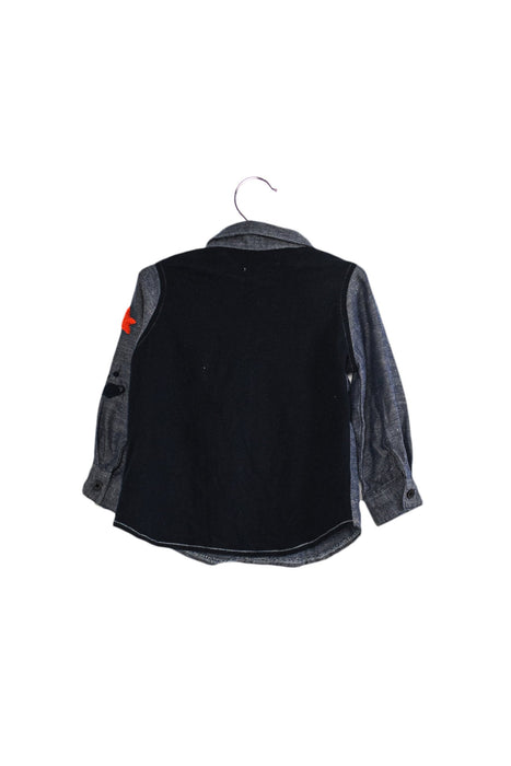 A Navy Shirts from IKKS in size 6-12M for boy. (Back View)