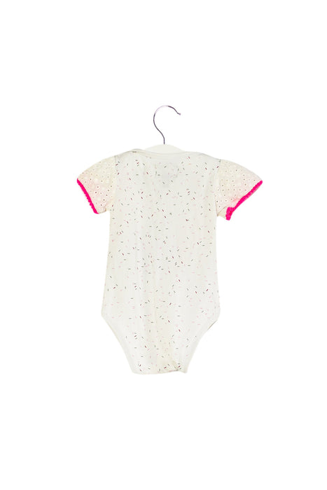 A White Short Sleeve Bodysuits from and the little dog laughed in size 3-6M for girl. (Back View)