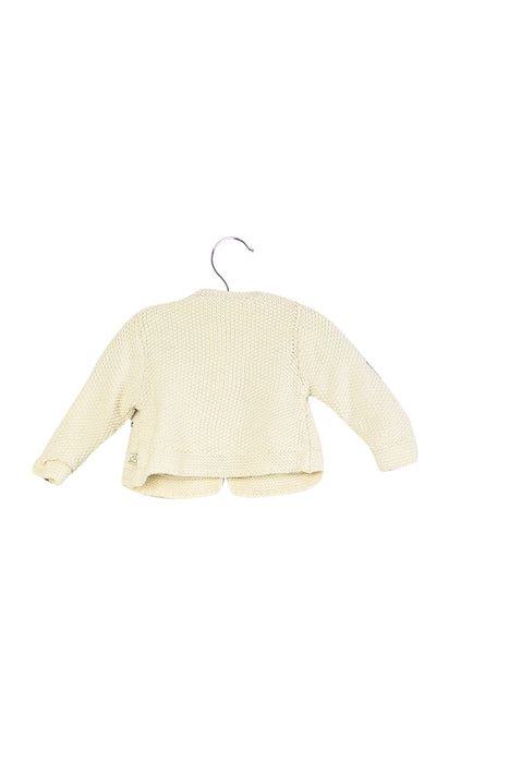 A Ivory Cardigans from Coudémail in size 3-6M for girl. (Back View)