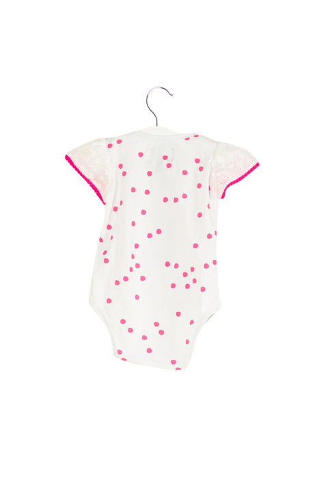 A White Short Sleeve Bodysuits from and the little dog laughed in size 3-6M for girl. (Back View)