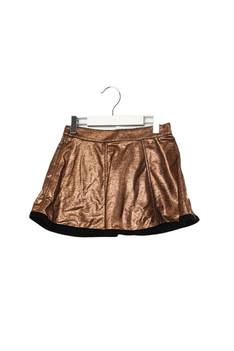 A Gold Short Skirts from IKKS in size 6T for girl. (Front View)