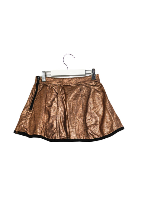 A Gold Short Skirts from IKKS in size 6T for girl. (Back View)