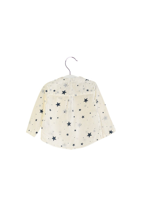 A White Long Sleeve Tops from Louis Louise in size 6-12M for girl. (Front View)