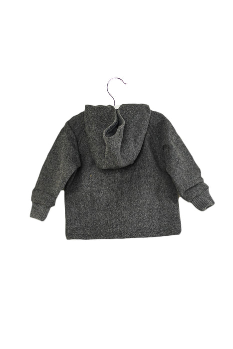 A Grey Coats from La Petite Collection in size 6-12M for neutral. (Back View)