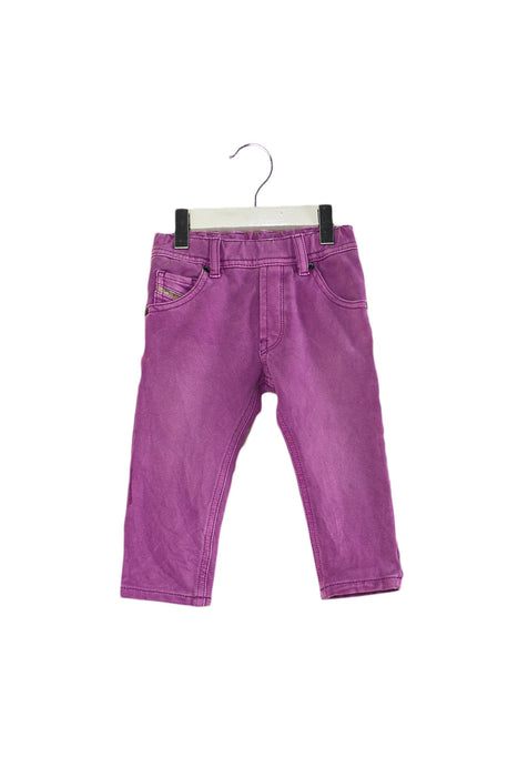 A Purple Jeans from Diesel in size 6-12M for girl. (Front View)