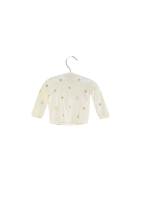 A Ivory Cardigans from Bonpoint in size 3-6M for girl. (Back View)
