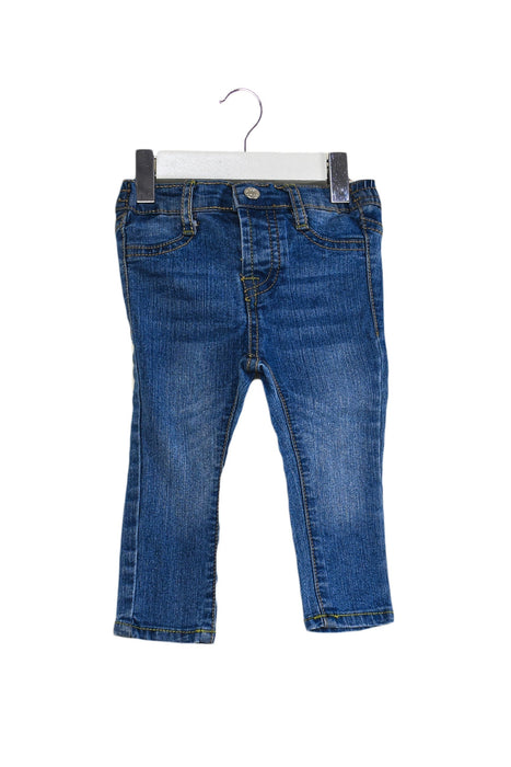 A Blue Jeans from 7 For All Mankind in size 6-12M for girl. (Front View)